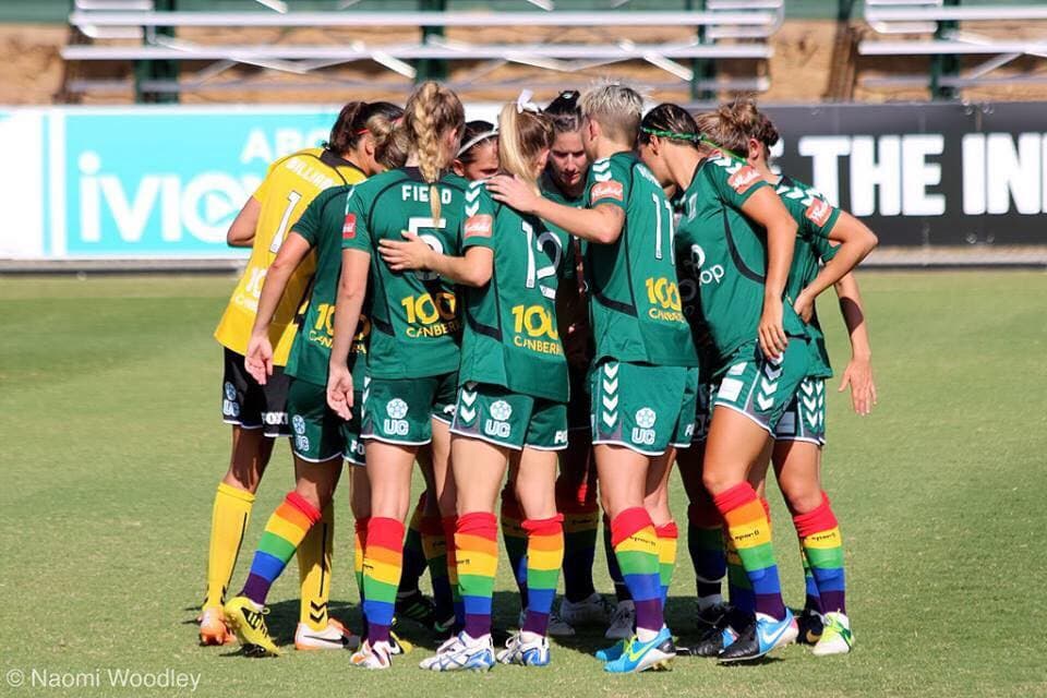 Women's Soccer Team in Huddle